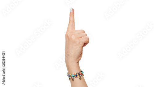 Side view of a woman’s hand pointing one finger upward with colorful nails and layered bracelets, isolated on transparent background