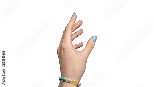Elegant woman’s hand posed with softly curved fingers, blue manicure and colorful bracelets, isolated on a transparent background