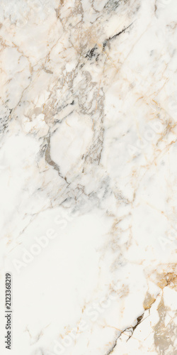 Elegant white calacatta marble surface with grey and gold veining pattern