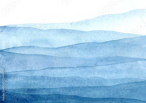 Abstract blue watercolor painting depicts a serene mountain landscape