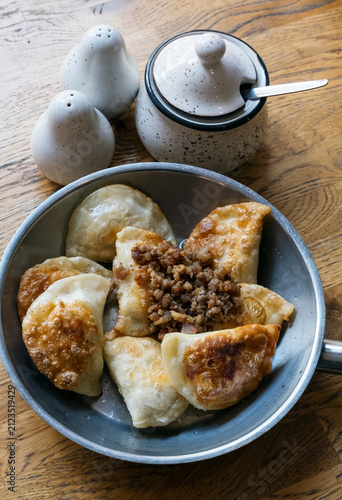 Fried pierogi with bacon in a Polish restaurant