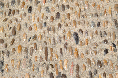 Quadro su tela Traditional stone pavement inside the historic Peñíscola Castle in Castellón, Spain, showing the textured surface of a medieval heritage site
