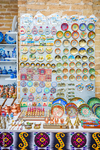 Принти на полотні Vibrant souvenir market display in Bukhara, Uzbekistan, featuring handcrafted ce