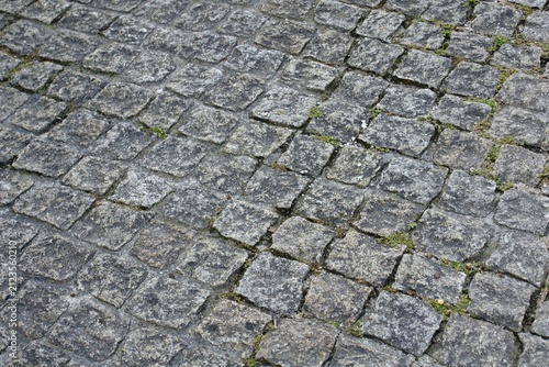 Cobblestone pavement surface texture with weathered granite