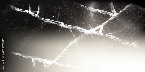 Foto Abstract texture of shattered glass with glowing light leak on black background