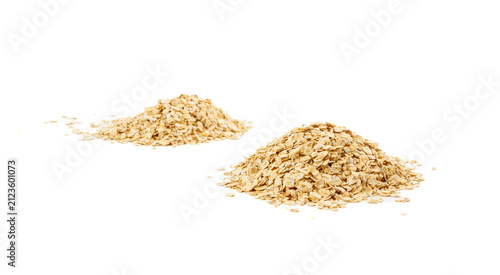 Foto Dry raw oat flakes isolated, rolled flat grains, instant porridge, thin cereals,