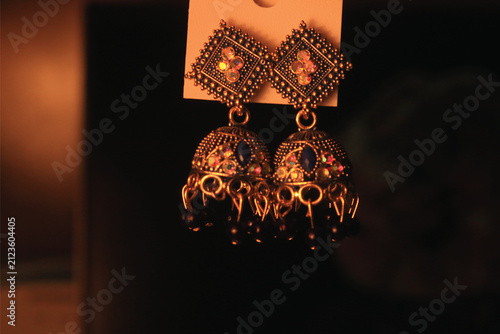 Canvas Print Traditional gold plated diamond shape jhumka earrings with blue embellishments e