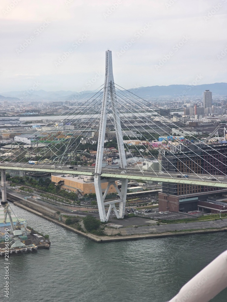 Fototapeta premium Cable-Stayed Bridge and Osaka Cityscape from Above, Japan