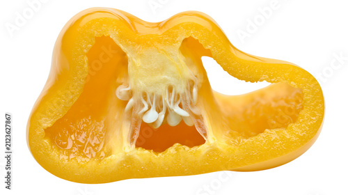 Foto Yellow bell pepper slice with visible seeds and internal structure, isolated on