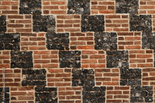 Quadro su tela Texture de briques rouges et noire abstraite sur un mur à Saint-Valery-sur-Somme