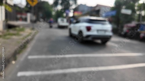 blurry view of cars on the road