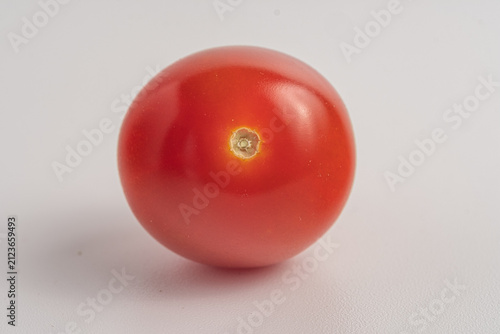 red tomato isolated on white