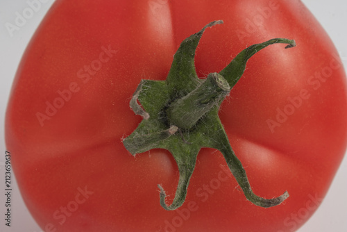 red tomato isolated on white