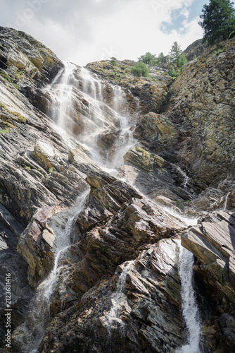 Waterfall near Rifugio Scarfiotti in the Rochemolles Valley, above Bardonecchia, Italian Alps.
