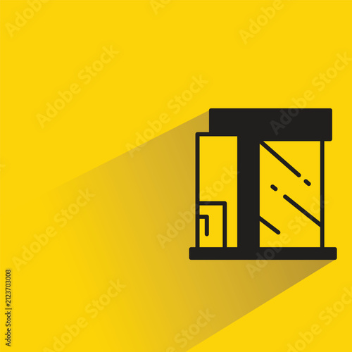 modern house building with shadow on yellow background