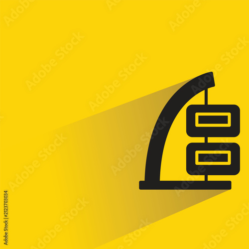 modern house building with shadow on yellow background