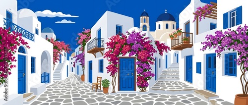 Traditional european village street scene with whitewashed buildings and flowers