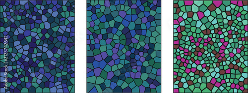 A beautiful stained glass mosaic pattern featuring intricate geometric shapes with vibrant blue green and purple hues creating a stunning artistic decorative surface background design