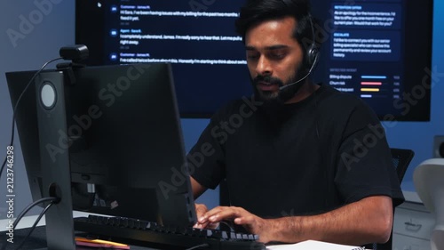Male Customer Service Agent, Technical Support, Headset, Online Consultation, IT Problem Solving at Call Center Office. Professional Support Agent talking to Customer during Online Live Support.