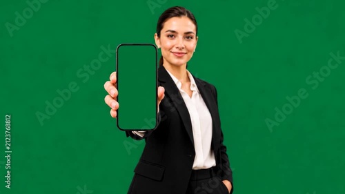 Woman Holding Smartphone with Green Screen Display Toward Camera, Mobile App Mockup, Digital Presentation, Blank Screen, Business Technology, Isolated Background
