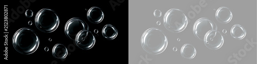 Cuadro en lienzo Transparent soap bubbles floating on black and transparent background