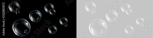 Canvastavla Transparent soap bubbles floating on black and transparent background