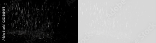Obraz na płótnie Heavy rain falling on a dark surface