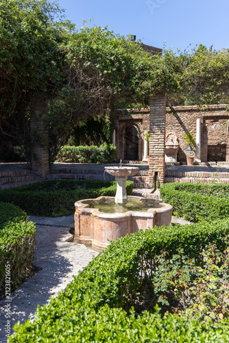 Patio de armas, green spaces around Alcazaba, 11th century Muslim palatial fortification, Malaga, Spain, Andalusia