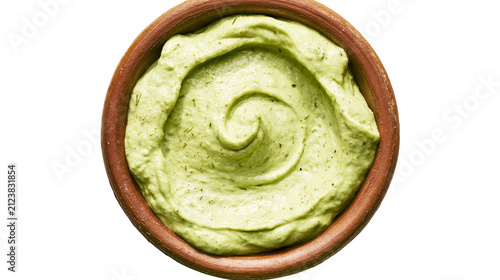 Quadro su tela Creamy green avocado dip swirled in a terracotta bowl, isolated on transparent b