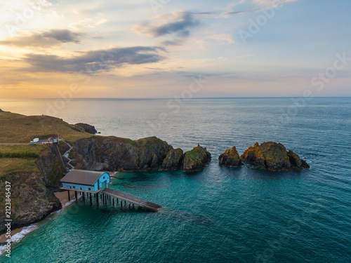 Stunning peaceful Summer sunset landscape over Trevose Head in Cornwall England