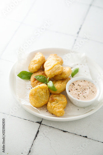 Homemade chicken nuggets with sauce