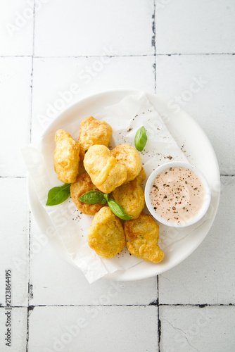 Homemade chicken nuggets with sauce