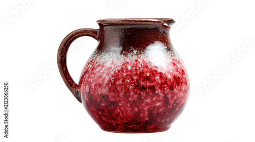 Handmade red ceramic pitcher with drip glaze finish, rustic pottery jug with handle for kitchen decor and fresh drinks on White background