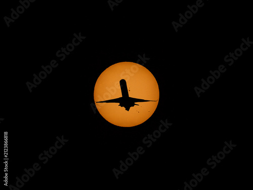Photograph of commercial airplanes photographed at sunset