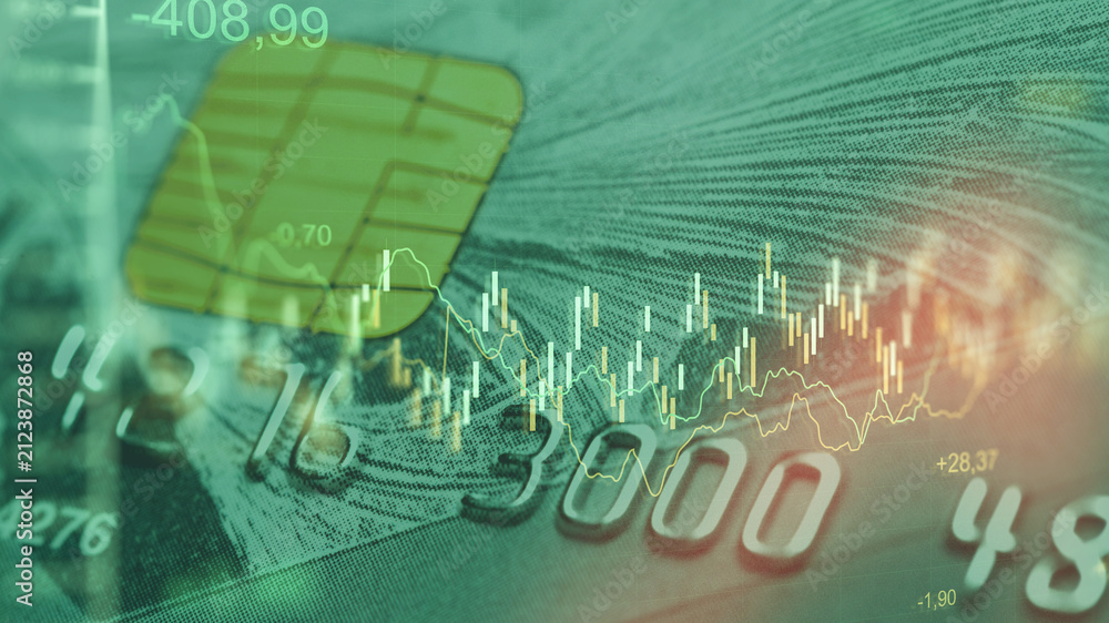 Naklejka premium Business chart showing stock exchange trading alongside a credit card graphic in a digital workspace setting