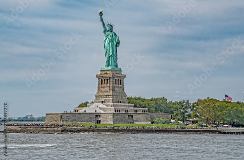 Fotografie statue of liberty  and ellis island new york city