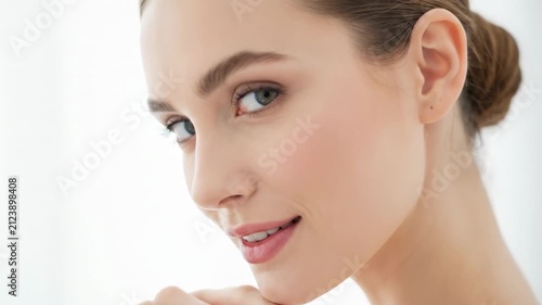 Beautiful Young Woman With Natural Makeup And Soft Smile.