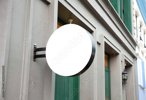 Photography Blank white round outdoor signboard mockup on modern building wall