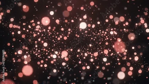 Rose Gold Glitter Particles Floating Against A Dark Abstract Background