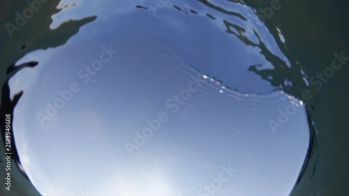 Calm sea waves, water surface.
