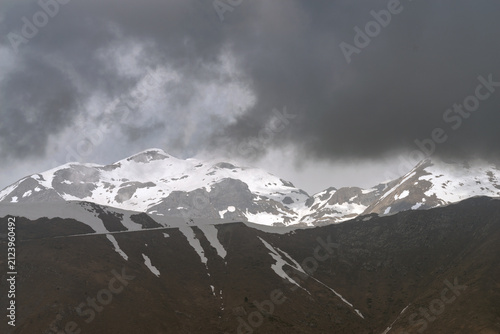 Dramatic storm clouds over Ligurian Alps mountain range, Italy