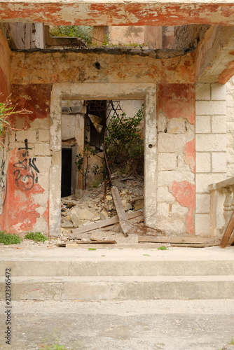 Rustic doorway frames crumbling ruins