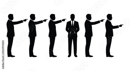 Businessmen pointing, gesturing and standing in silhouette.