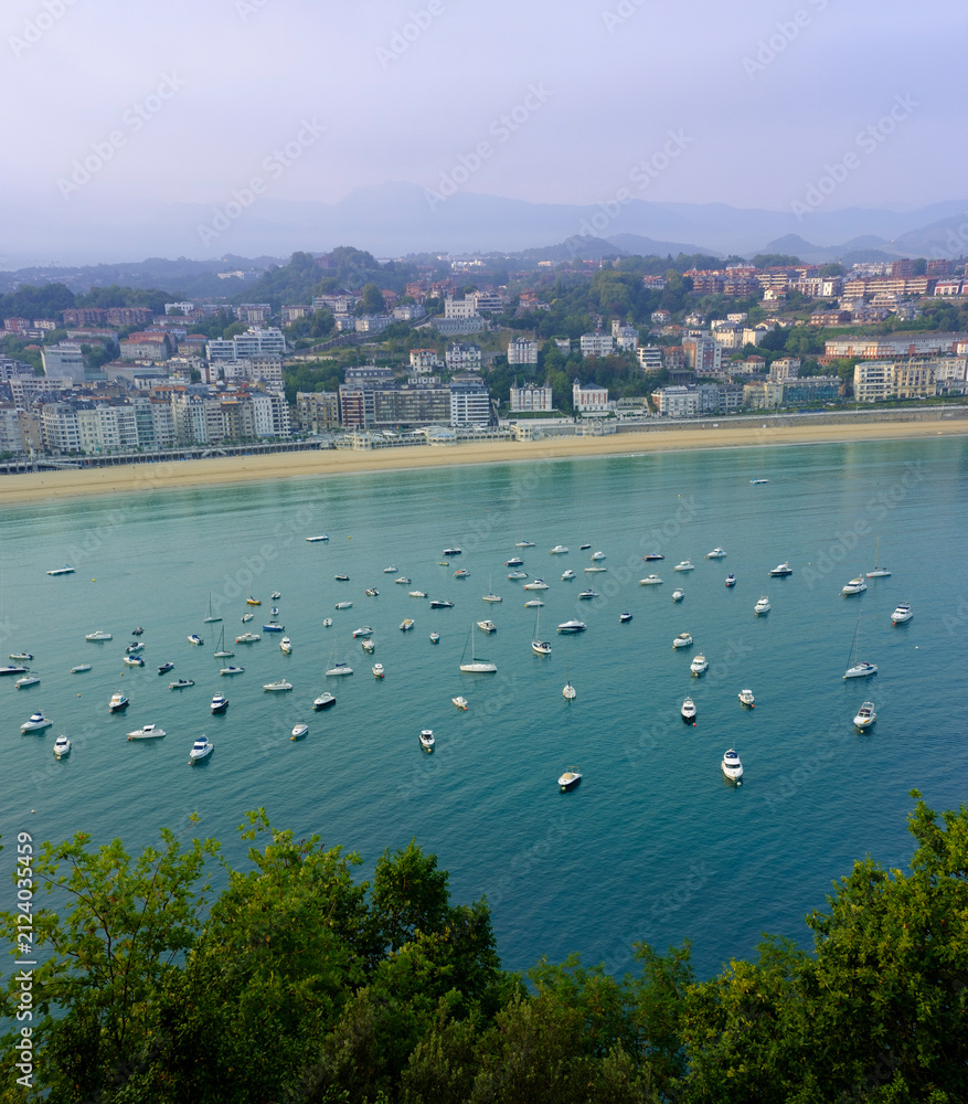 Fototapeta premium Pleasure Boats in La Concha Bay, San Sebastian (Donostia), Basque Country, Spain – Morning View from Mount Urgull