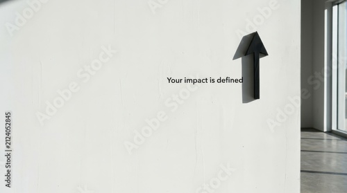 A Stark Minimalist Black Arrow Points Upward on a White Surface, Symbolizing Growth and Progress