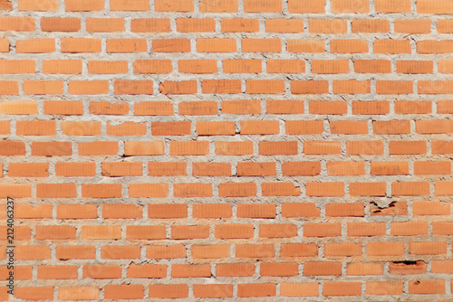 Red brick wall texture with white mortar lines