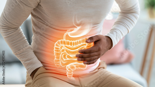 Digestive discomfort stomach pain abdominal pain man holding stomach digestion gut intestine discomfort