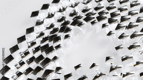 Transparent glass cubes are arranged in a repeating circular pattern on a bright white abstract Background
