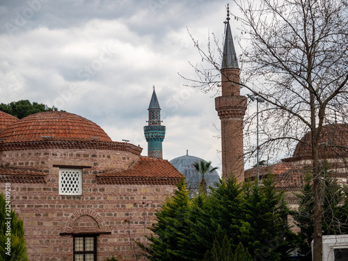 Obraz na plátně Mosque domes and minarets against a cloudy sky.