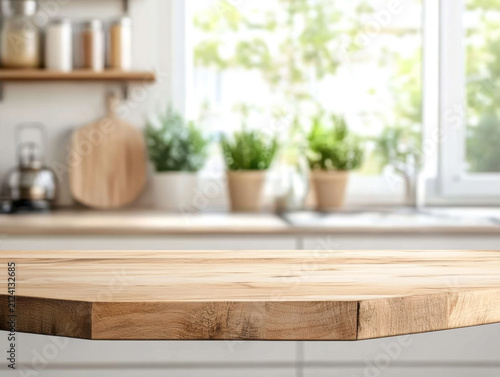 Wooden cutting board on white table in kitchen, closeup. Space for text